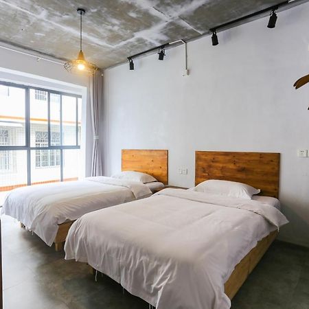 ז'אנגג'יאג'י Hostel Geographer מראה חיצוני תמונה