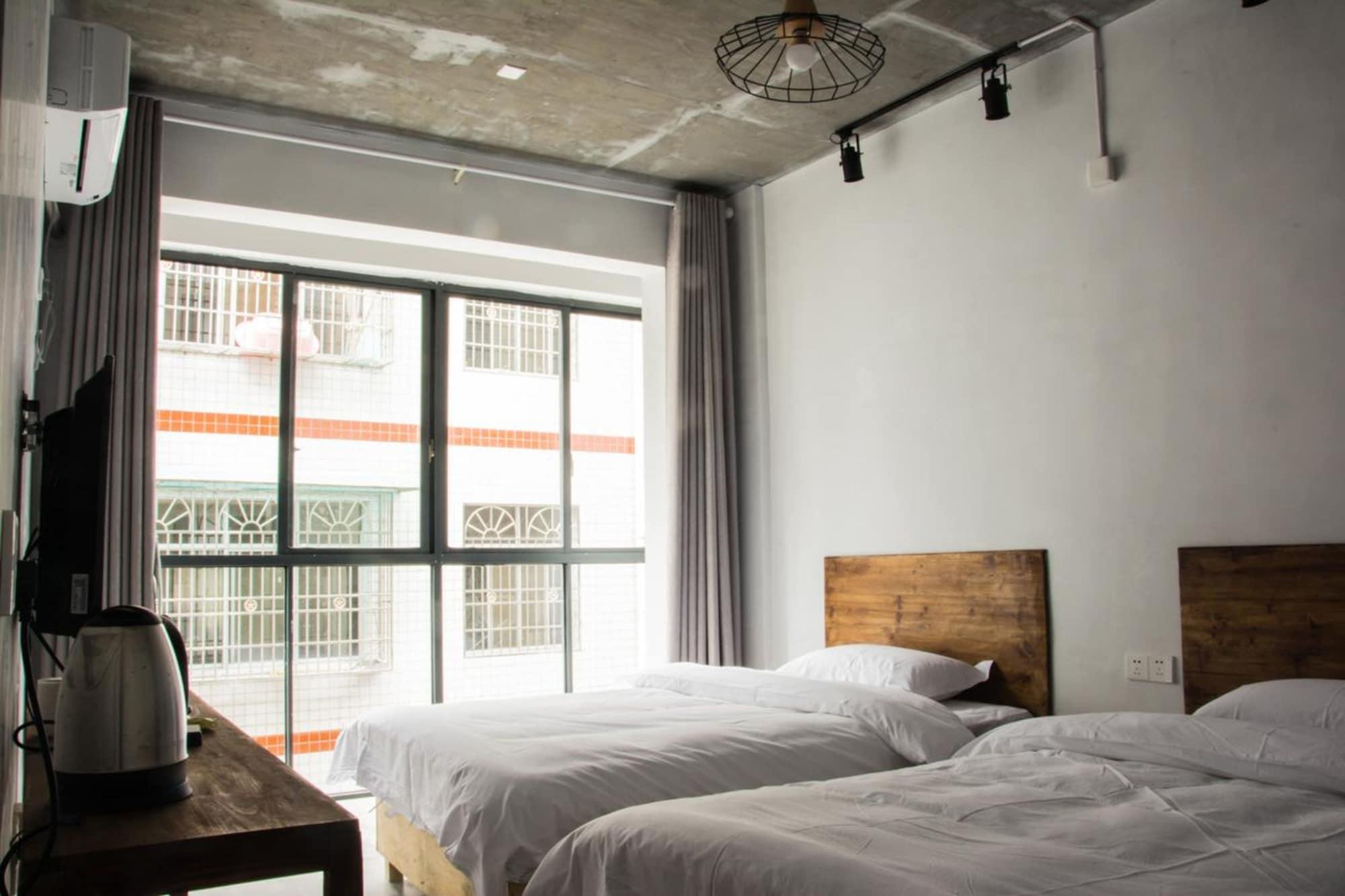 ז'אנגג'יאג'י Hostel Geographer מראה חיצוני תמונה