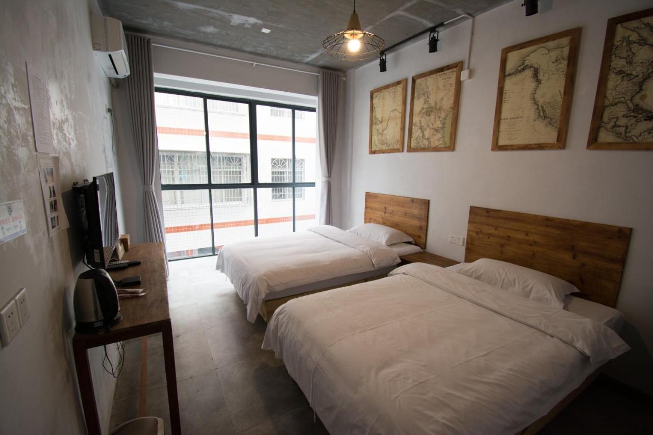 ז'אנגג'יאג'י Hostel Geographer מראה חיצוני תמונה
