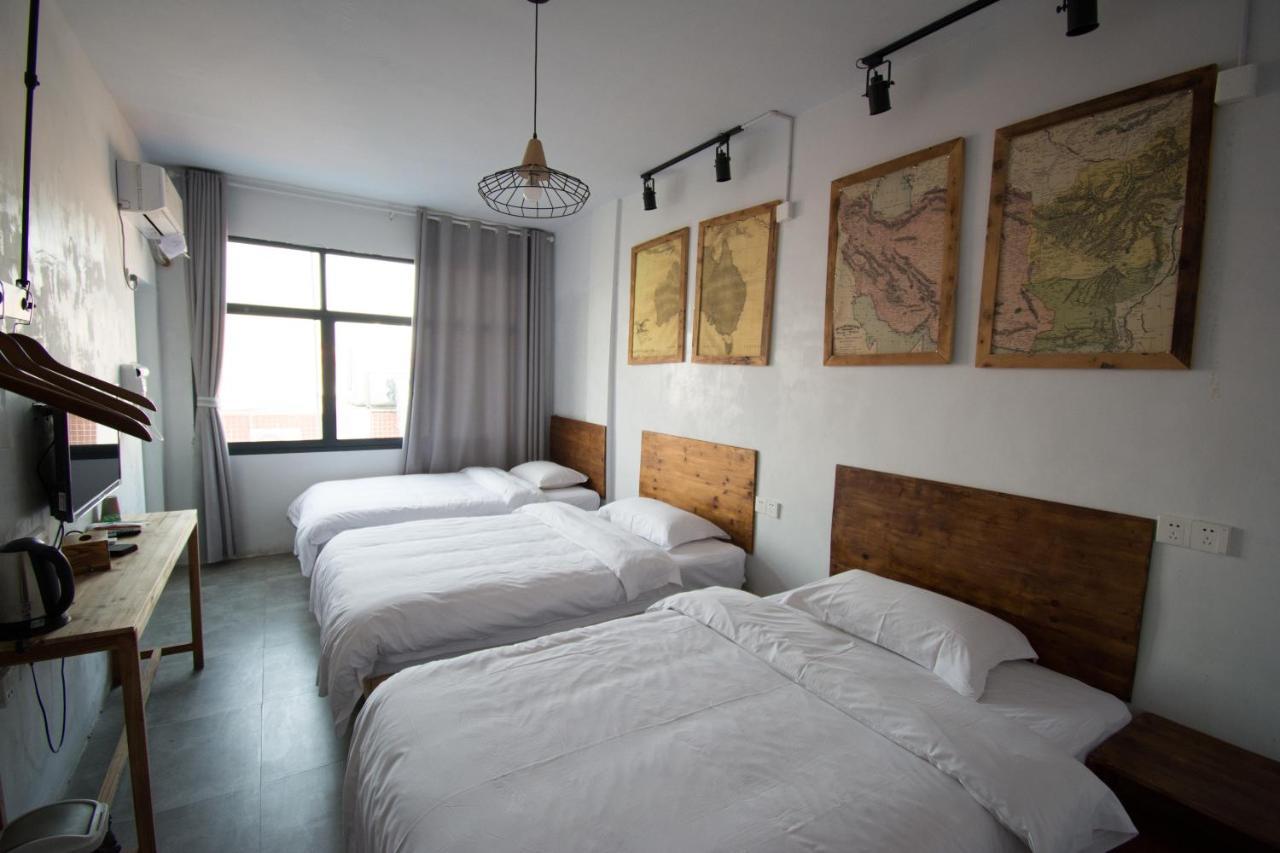 ז'אנגג'יאג'י Hostel Geographer מראה חיצוני תמונה