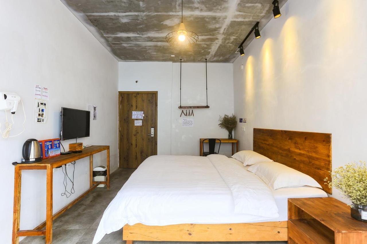 ז'אנגג'יאג'י Hostel Geographer מראה חיצוני תמונה