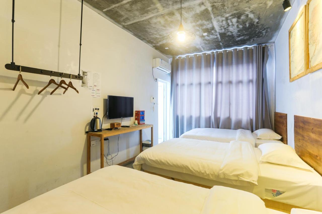 ז'אנגג'יאג'י Hostel Geographer מראה חיצוני תמונה